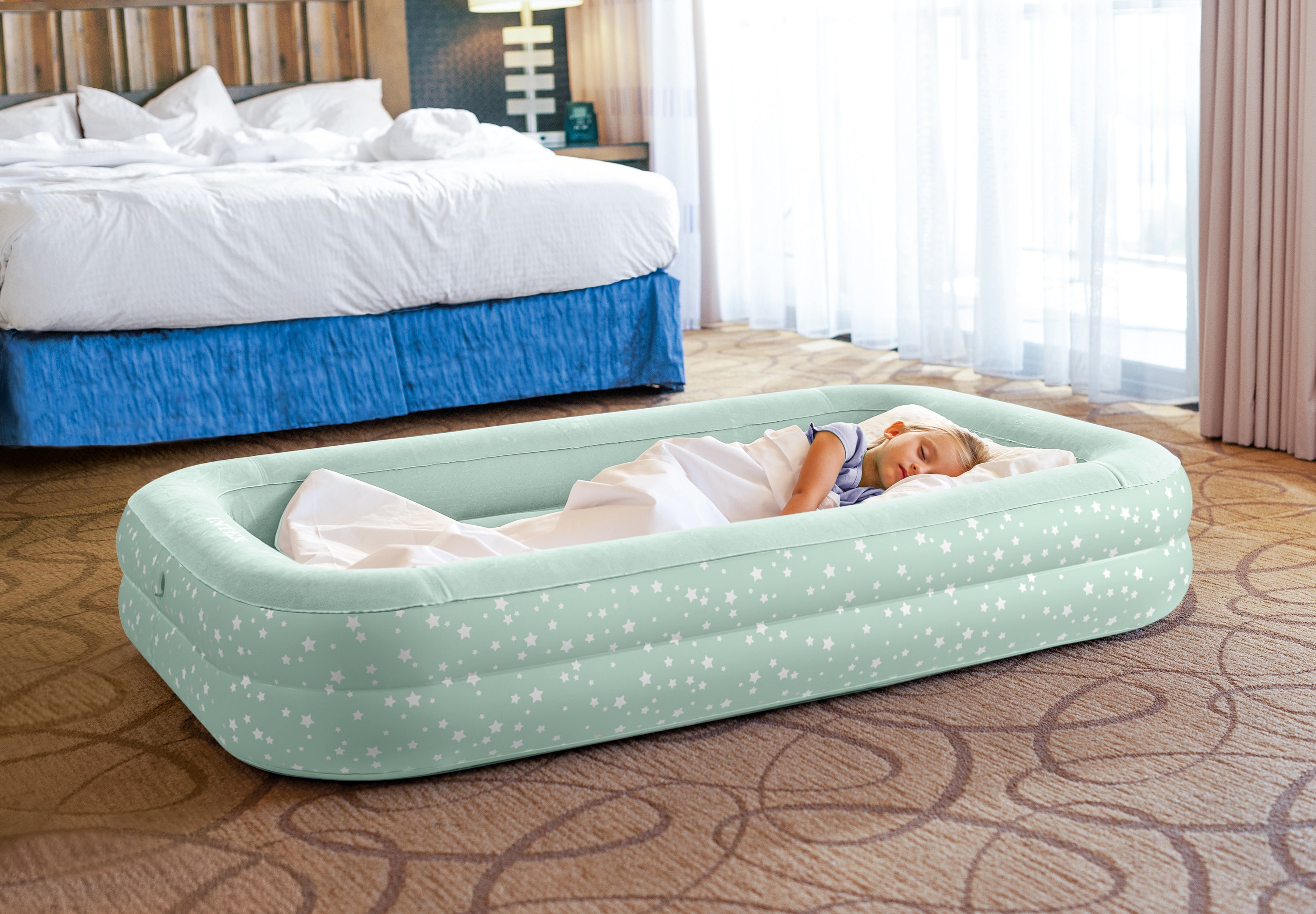 Inflatable Mattresses: Intex Kidz Inflatable Travel Bed set with Hand Pump - Stars. Great for Travel 66810