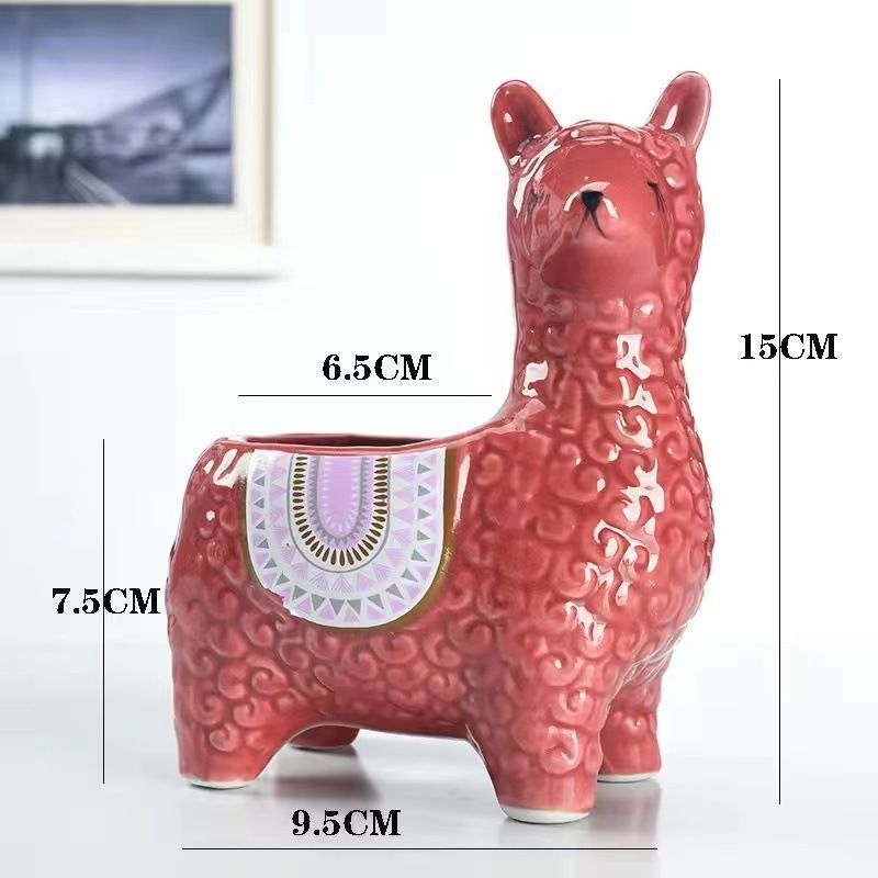 Blue Ceramic Planter with Head Tilted Alpaca