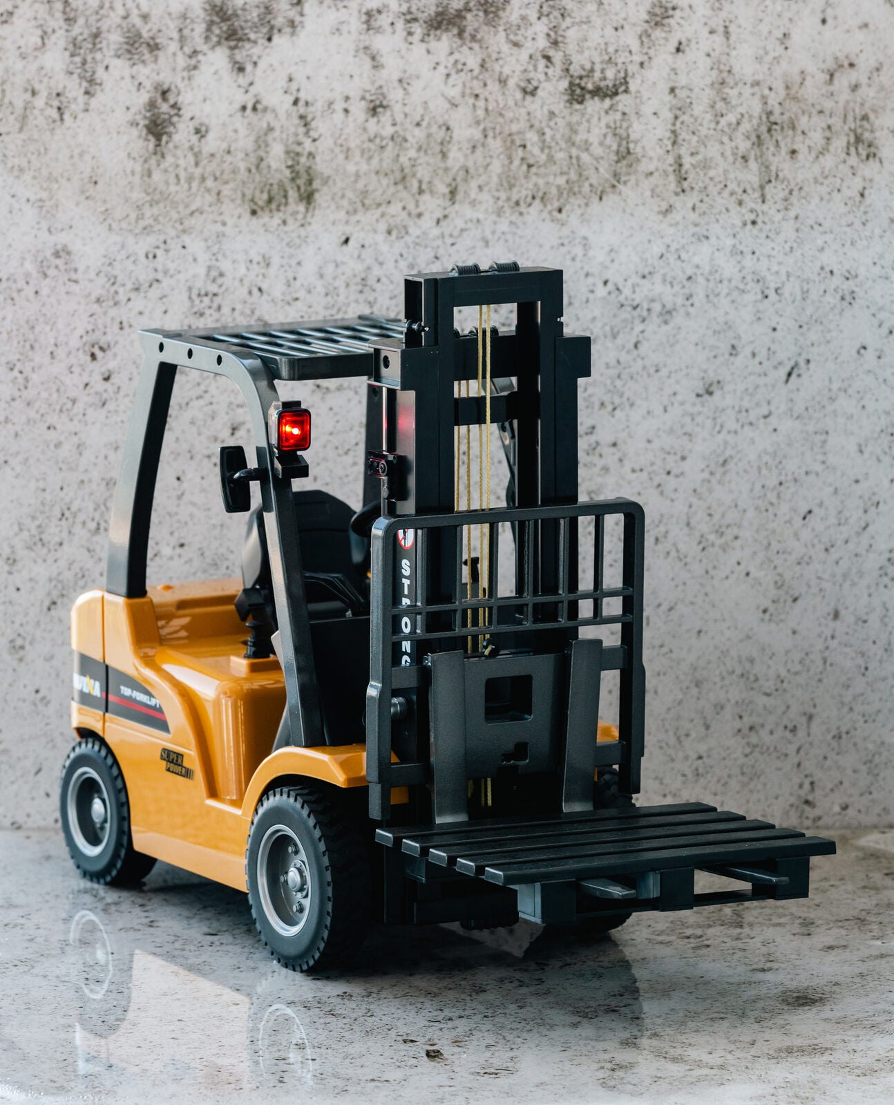 Activity Toys: 1:10 Scale 2.4G 8-Channel Metal Remote Control Forklift Construction Vehicle with Lifting Function & Sound