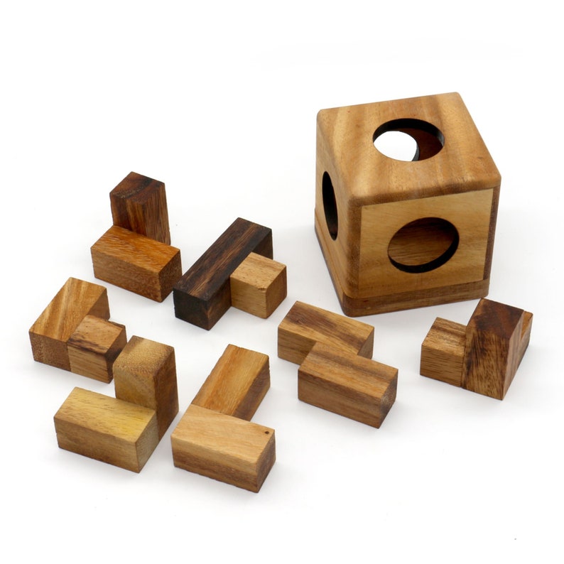 Board Games: 3 individual brainteaser wooden puzzles in a gift wooden box