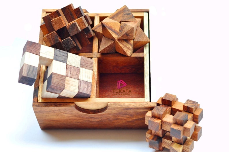 Board Games: 4 individual brainteaser wooden puzzles in a gift wooden box