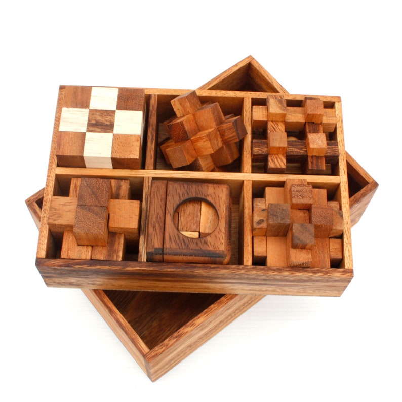Board Games: 12 Puzzle Brain teaser interlocking wooden Puzzle set in a Deluxe Gift Box -for kids or adults