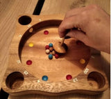 Board Games: Rollele Roulette ball spinning board game for the whole family.