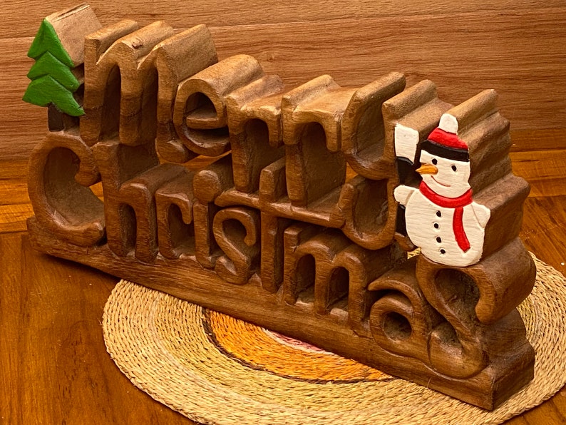 Christmas Decorations: Wooden carved Merry Christmas decoration 38 cm long with Tree and Star