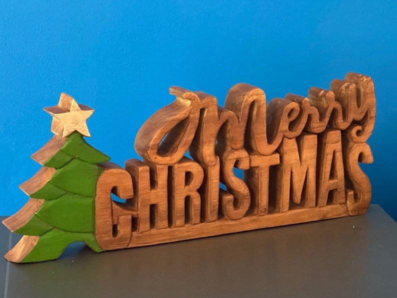 Christmas Decorations: Wooden carved Merry Christmas decoration 38 cm long with Tree and Star