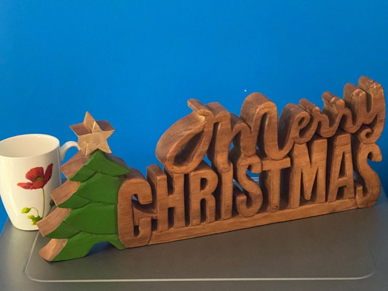Christmas Decorations: Wooden carved Merry Christmas decoration 38 cm long with Tree and Star