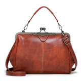 Adjustable Leather Crossbody Bag with Vintage Buckle - Red