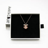 Women's Jewellery: Gift Box - Angel Ball Rose Gold Aroma Necklace + Purify Oil Blend