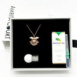 Women's Jewellery: Gift Box - Angel Ball Rose Gold Aroma Necklace + Purify Oil Blend