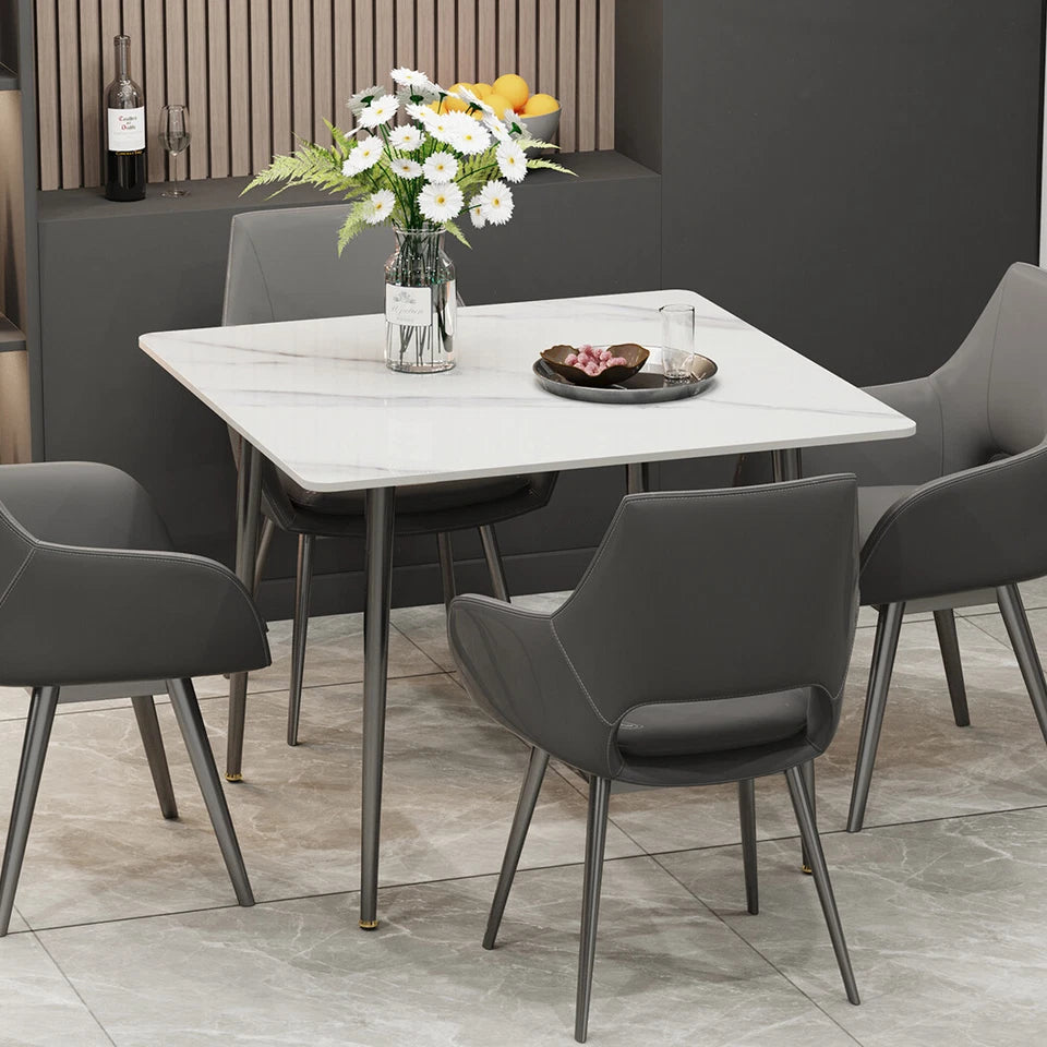 Dining Tables: White Sintered Stone Dining Table With Black Legs For Modern Interiors