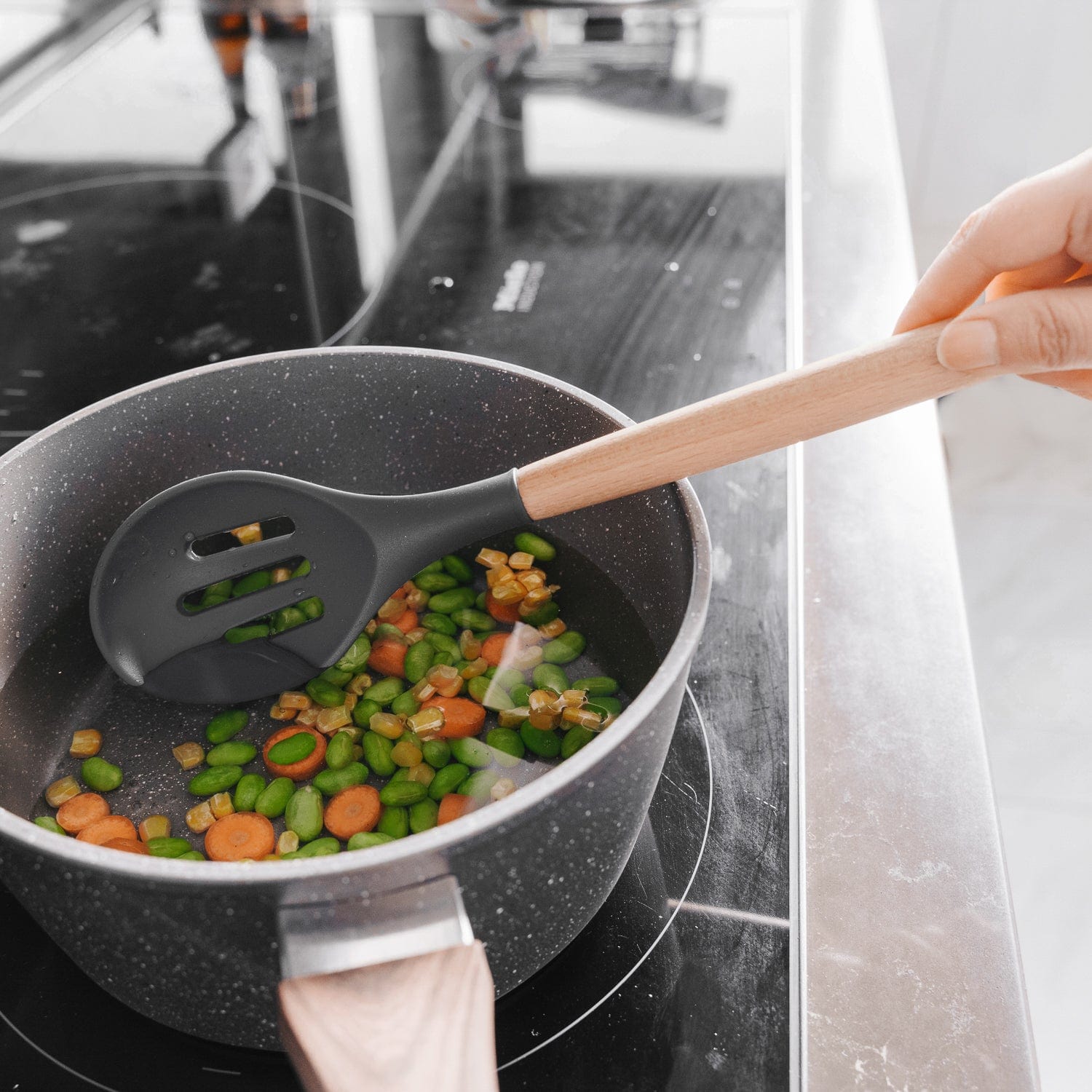 Kitchen Utensils: Beechwood & silicone slotted spoon charcoal