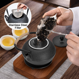 Drinkware: 1.2L Cast Iron Teapot and Warmer Set Tea Kettle Iron Bottle With Stainless Steel Mesh Infuser and Anti-Scald Handle Compatible with Multi-Heat Source Black
